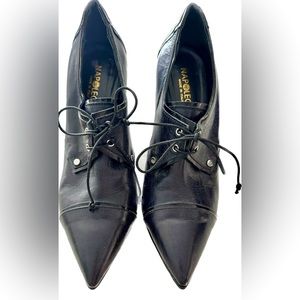 Napoleoni leather booties. High heeled. Worn a few times.